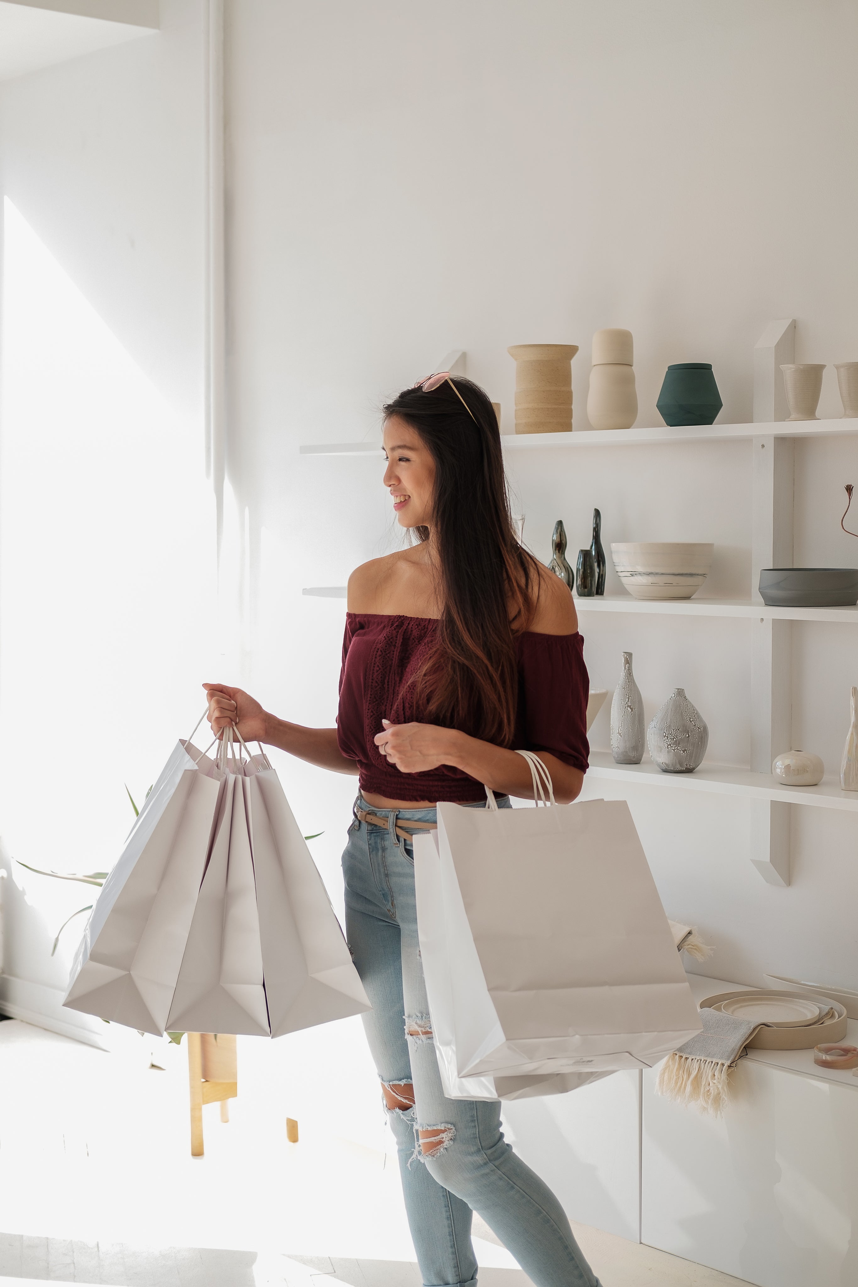 female-with-white-shopping-bags.jpg